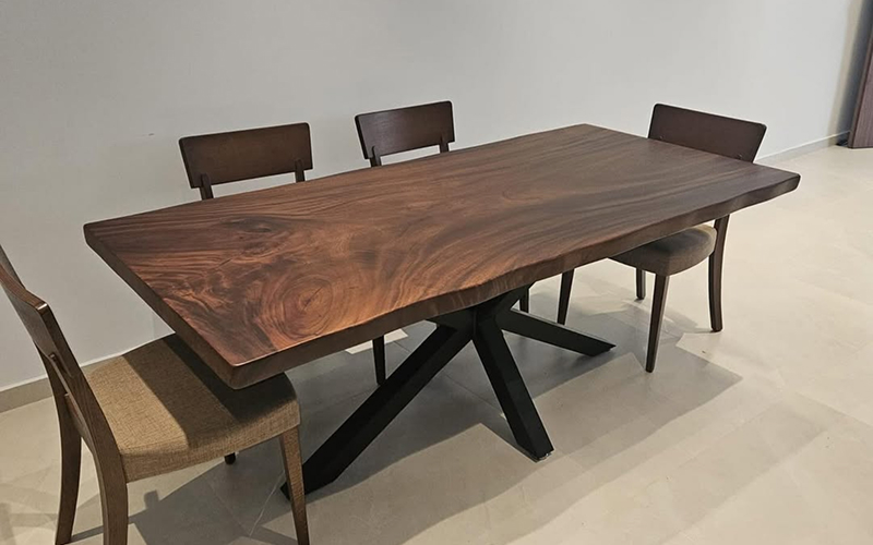 03 7 Wood Capitol Suar wood table with spider legs.